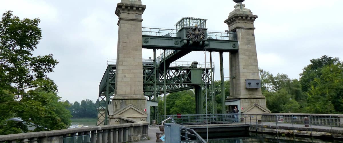 A historic bridge with ornate towers and a central archway.