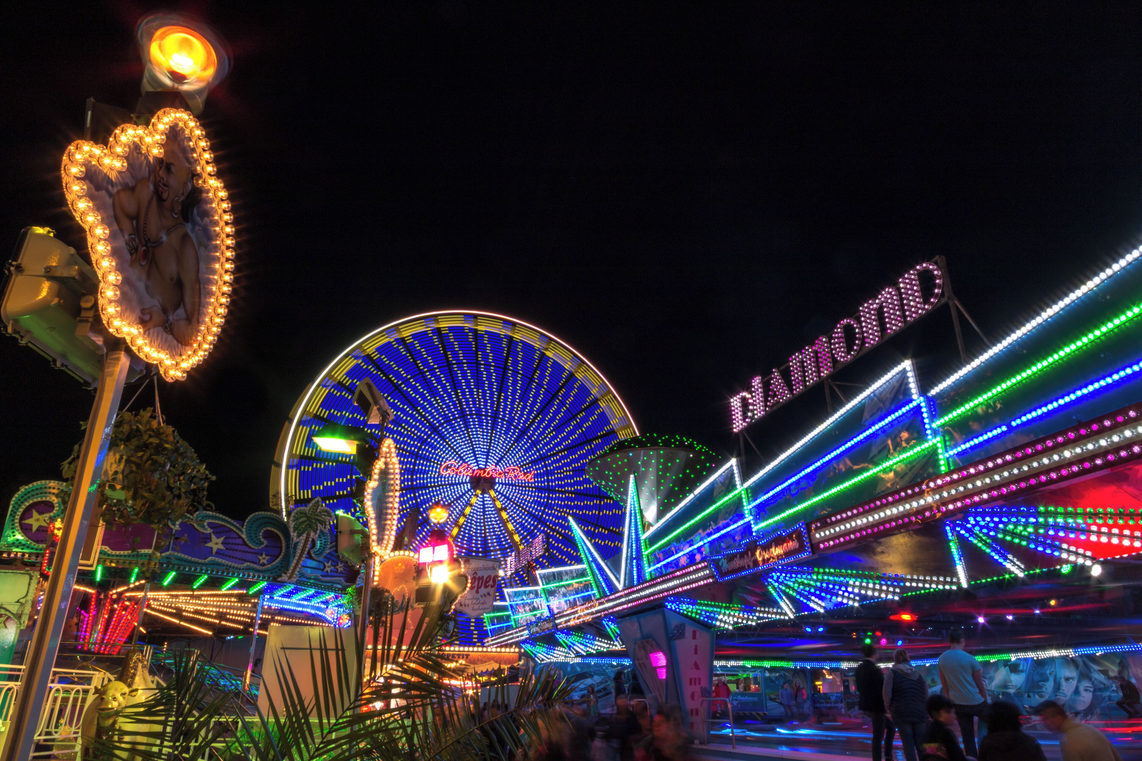 Light traces of a ferris wheel, Viktorkirmes in Dülmen, North Rhine-Westphalia, Germany