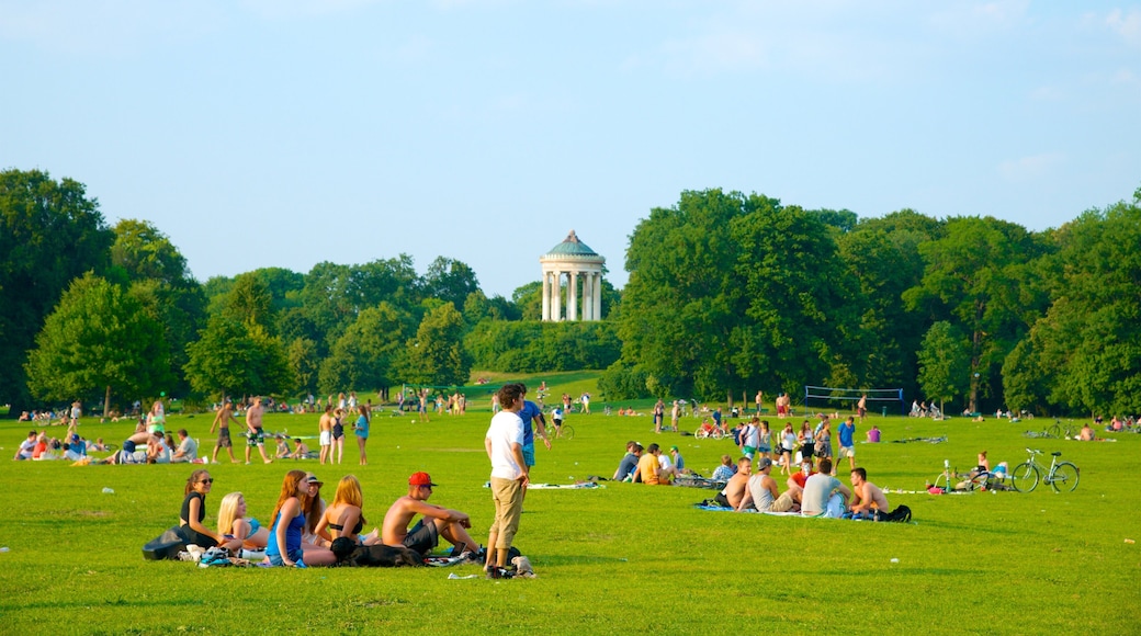 Englischer Garten Süd featuring a park as well as a large group of people