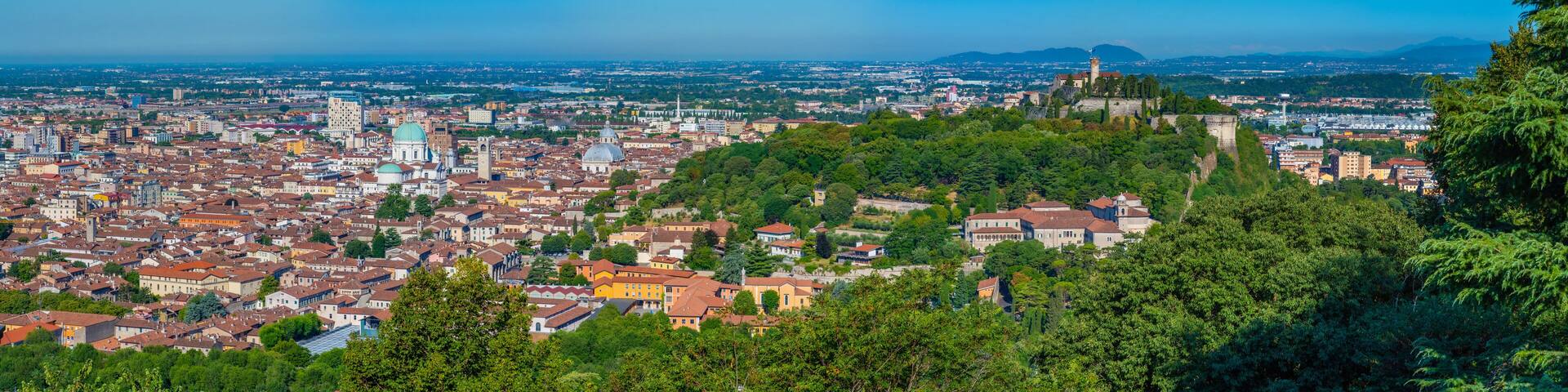 Aerial view of Brescia with castle on a hill, Italy