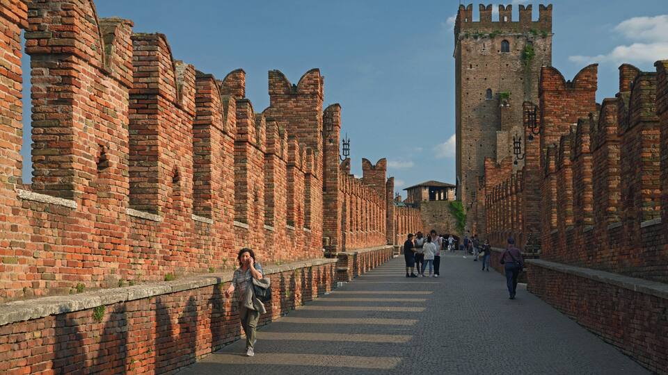 The Scaliger Bridge and the Tower of Castelvecchio at sunset. Verona, Italy