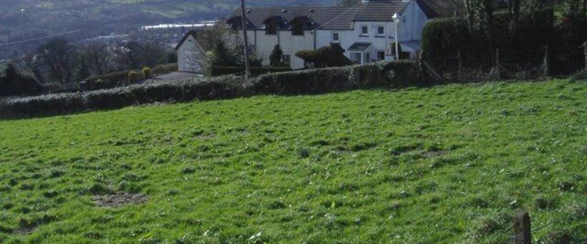 Dewallt A narrow lane runs downhill towards Pontymister, past this group of cottages, from Pontymason Lane.