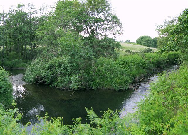Sidestep on the river Dulais The river Dulais runs southwest into shot from the right, turns 90 degrees northwest and then back to the southwest again out of the left of shot.