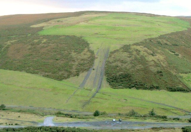 Cwm Dulais. Old tracks at a disused colliery provide access to the bottom of the valley from the better road above. The tracks on the hill opposite show how the relative isolation allows unofficial motorsports.