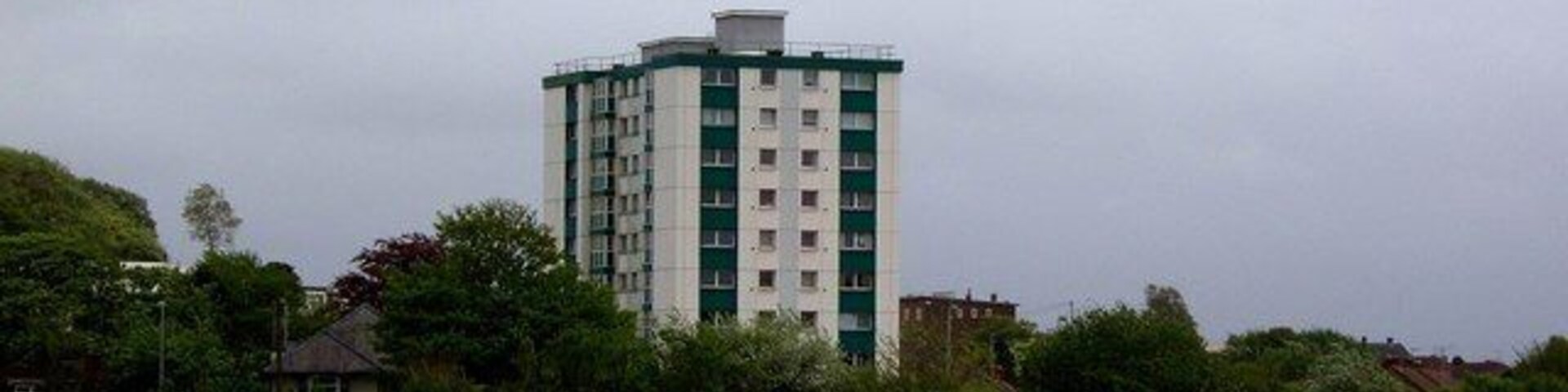 Clase. Tower block at Clase, near Morriston, Swansea. Seen from the western edge of the grid square, looking across Mynydd-bach common.