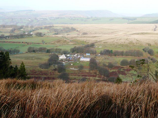 Tir Sion Siencyn I have spelt this complex of buildings the Welsh way, after the hillside on which it stands. This on the north side of Cwm y Glyn (the A472 is unseen in the valley) taken from above the forestry on Mynydd Llwyd.