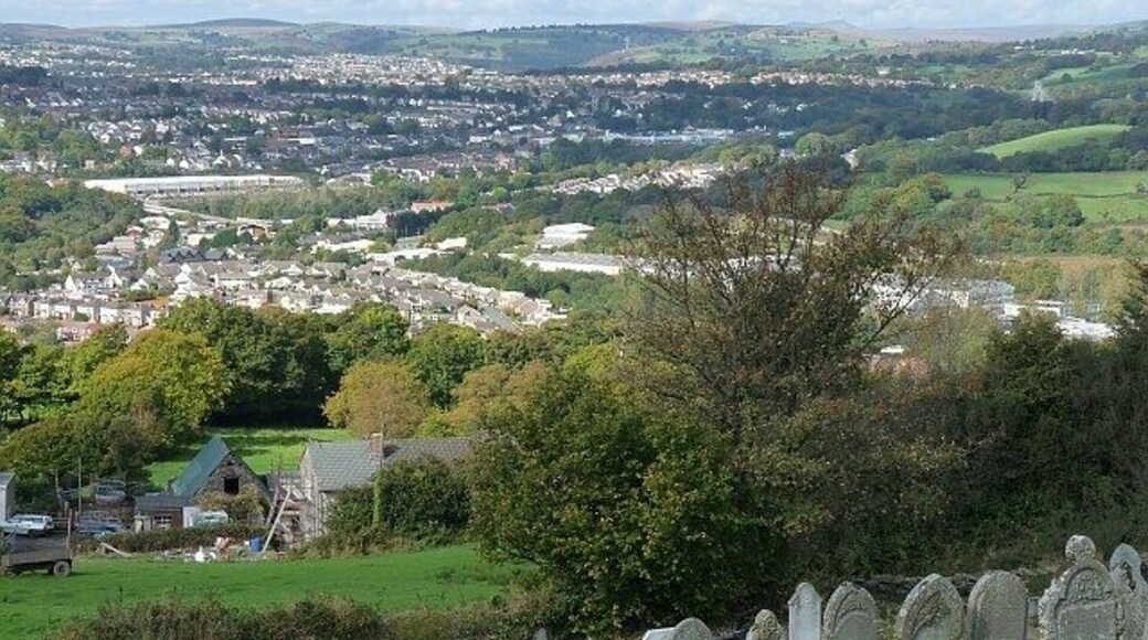 View over the Sirhowy Valley. Taken from the churchyard of New Bethel Church, Mynyddislwyn 1570832. Overlooking Ty-Fry Farm, Cwmnantyrodyn, Pontllanfraith and Blackwood with the tower of Chartist Bridge https://www.geograph.org.uk/photo/764929 visible at the upper right. On the horizon are the peaks of the Brecon Beacons https://www.geograph.org.uk/photo/18832 .