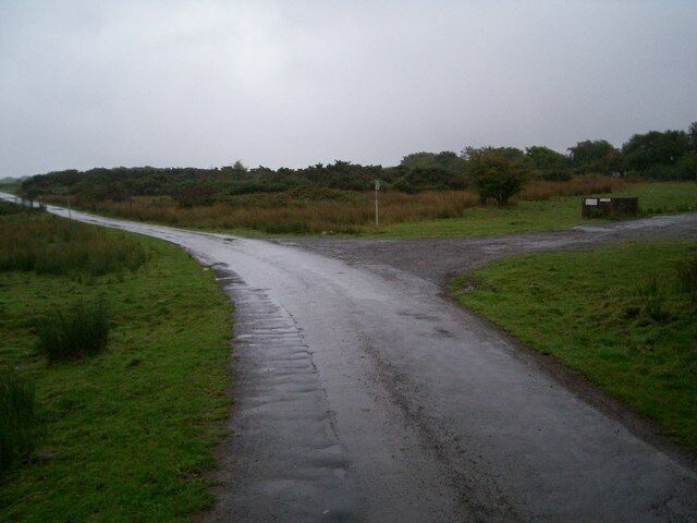 Pwll-y-froga. Entrance to Pwll-y-Froga on right , with footpaths diverging right and left, and also straight ahead, in the middle distance.