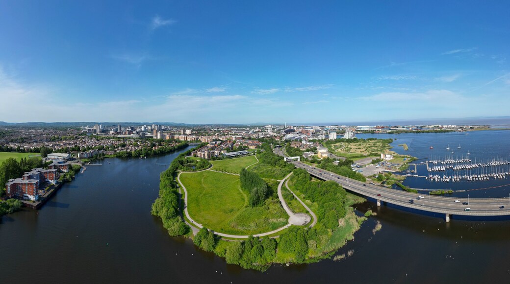 180° Aerial Drone Panorama Over Cardiff Bay, River Ely, Hamadryad Park, Cardiff Bay Wetlands Reserve, Cardiff Bay Link Road, and the City Skyline on a Clear Summer Day, Wales, United Kingdom - 1/2