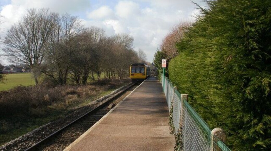 Train leaves Rhiwbina railway station, Cardiff An Arriva Trains Wales train is heading for Whitchurch station, then the end of the line at Coryton.