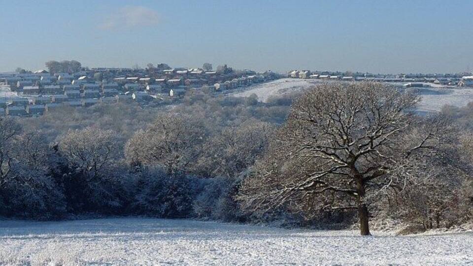 Snowy view across the Rhymney Valley. From 1633376 looking west towards Hengoed.