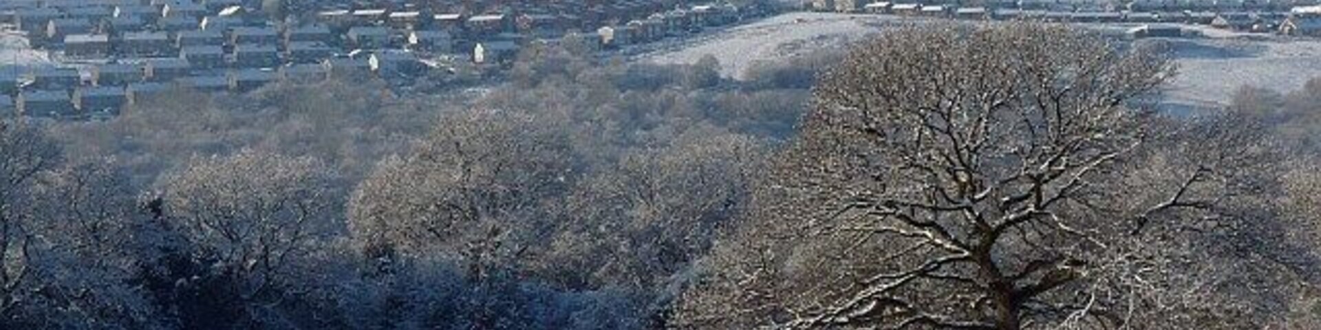 Snowy view across the Rhymney Valley. From 1633376 looking west towards Hengoed.