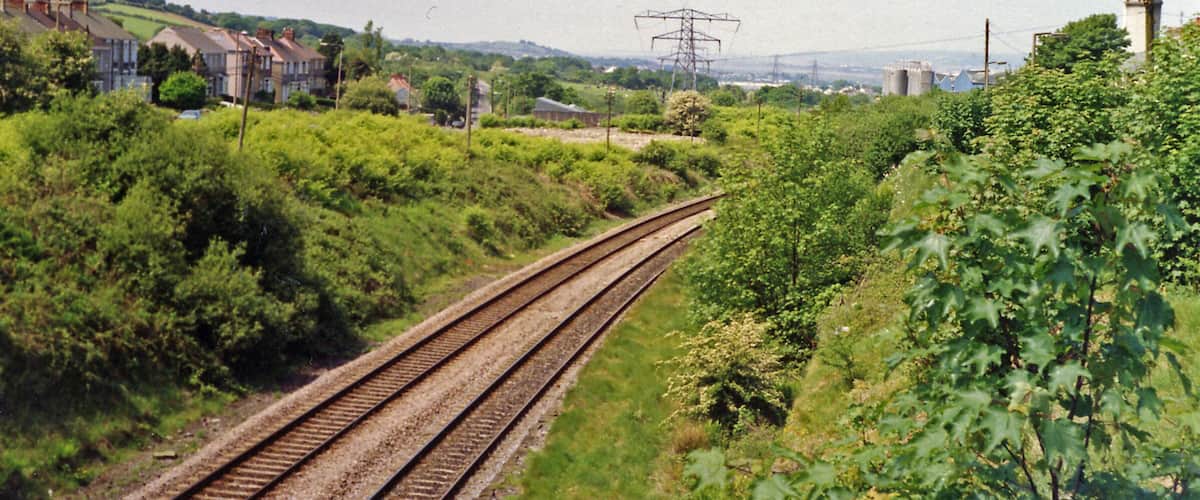 Site of Cockett station. View westward, towards Llanelli, Carmarthen etc.: ex-Great Western South Wales main line. The station, which had been mainly behind me on the east side of the bridge, was closed to passengers on 15/6/64, to goods 13/9/65.