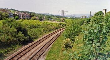 Site of Cockett station. View westward, towards Llanelli, Carmarthen etc.: ex-Great Western South Wales main line. The station, which had been mainly behind me on the east side of the bridge, was closed to passengers on 15/6/64, to goods 13/9/65.