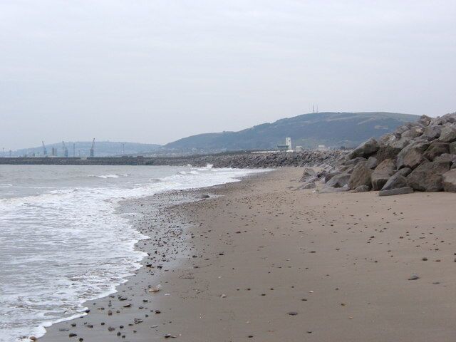 Jersey Marine Beach Swansea Docks and Sewage Works in the background.