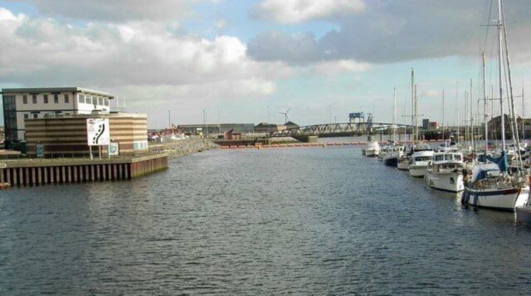 Tawe crossings Looking downstream along the River Tawe. Taken from the sail bridge 357849, towards the former railway bridge which linked the former South Dock with the main Swansea dock complex. The original Swansea Harbour & Improvement Trust soon changed their name to Swansea Harbour Trust. (Much more respectable initials!!!)