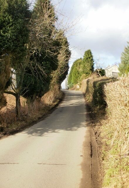 Steep climb on Cwrt-y-Bella approaching Darran Farm The AZ South Wales Valleys East Street Atlas is very useful on walks, showing many features in addition to streets, but contours are not shown. Thus I did not know what lay ahead along Cwrt-y-Bella, from the B4251 to Gwrhay. This photo shows a steep climb along the edge of Darran Farm.