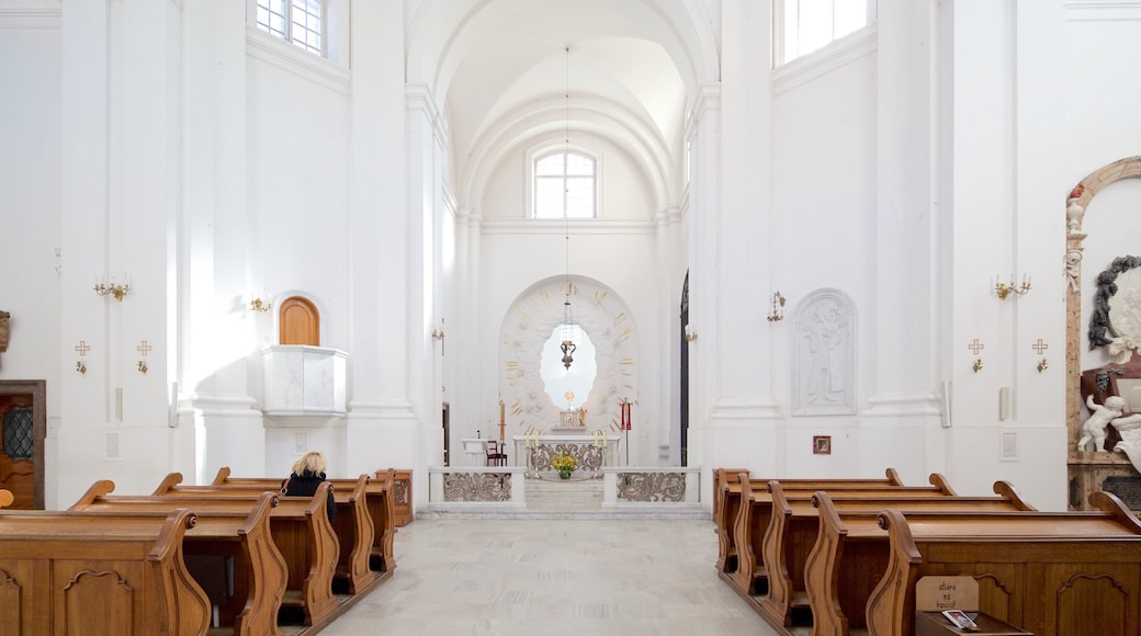 St. Kazimierz Church featuring heritage elements, a church or cathedral and interior views