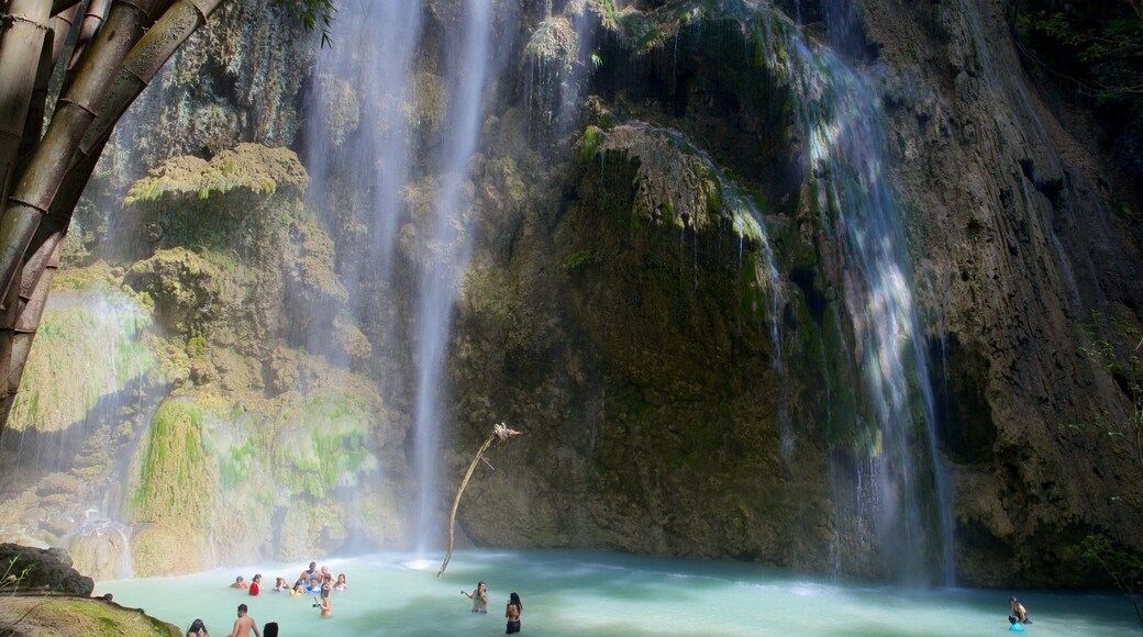 Oslob showing caves and swimming