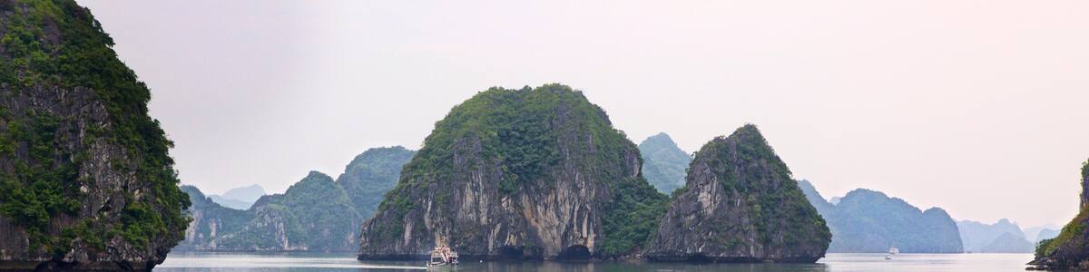 Halong Bay featuring mountains and a bay or harbor