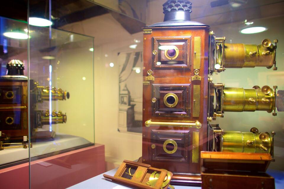 A vintage camera on display in a museum.