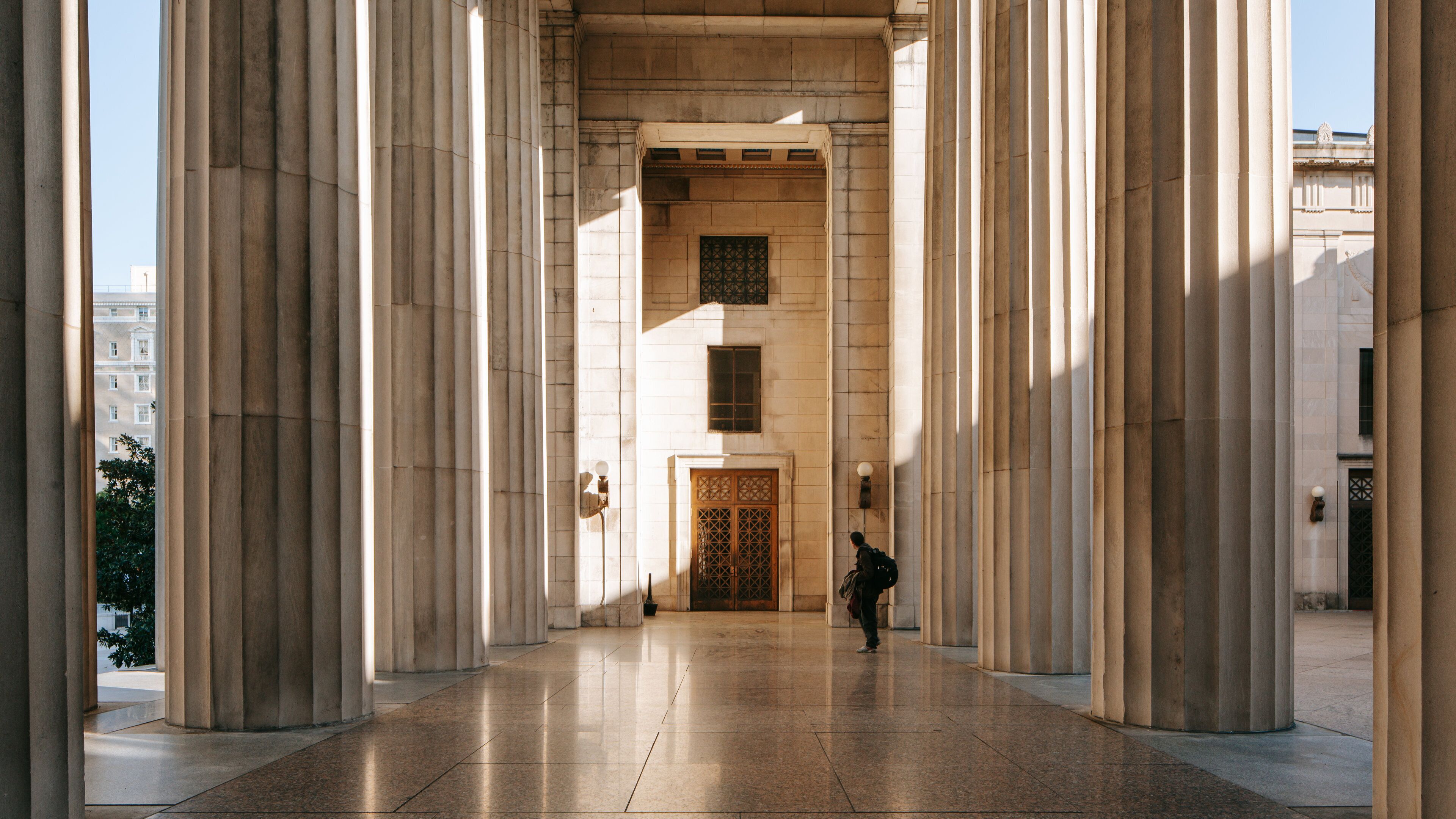 Legislative Plaza which includes heritage architecture as well as an individual male