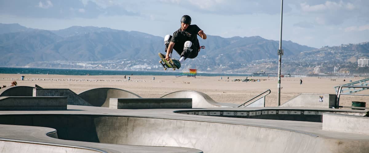 Venice Skate Park showing a sporting event as well as an individual male