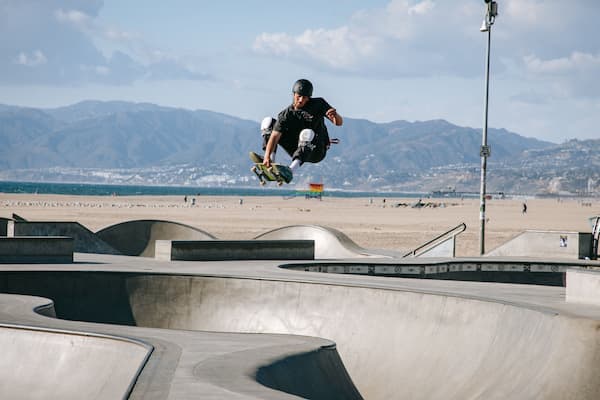 Venice Skate Park showing a sporting event as well as an individual male