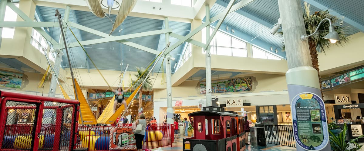Coastal Grand Mall featuring interior views, shopping and a playground