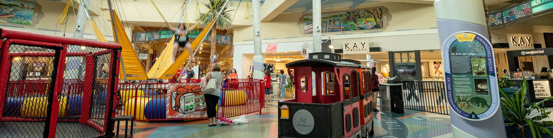 Coastal Grand Mall featuring interior views, shopping and a playground