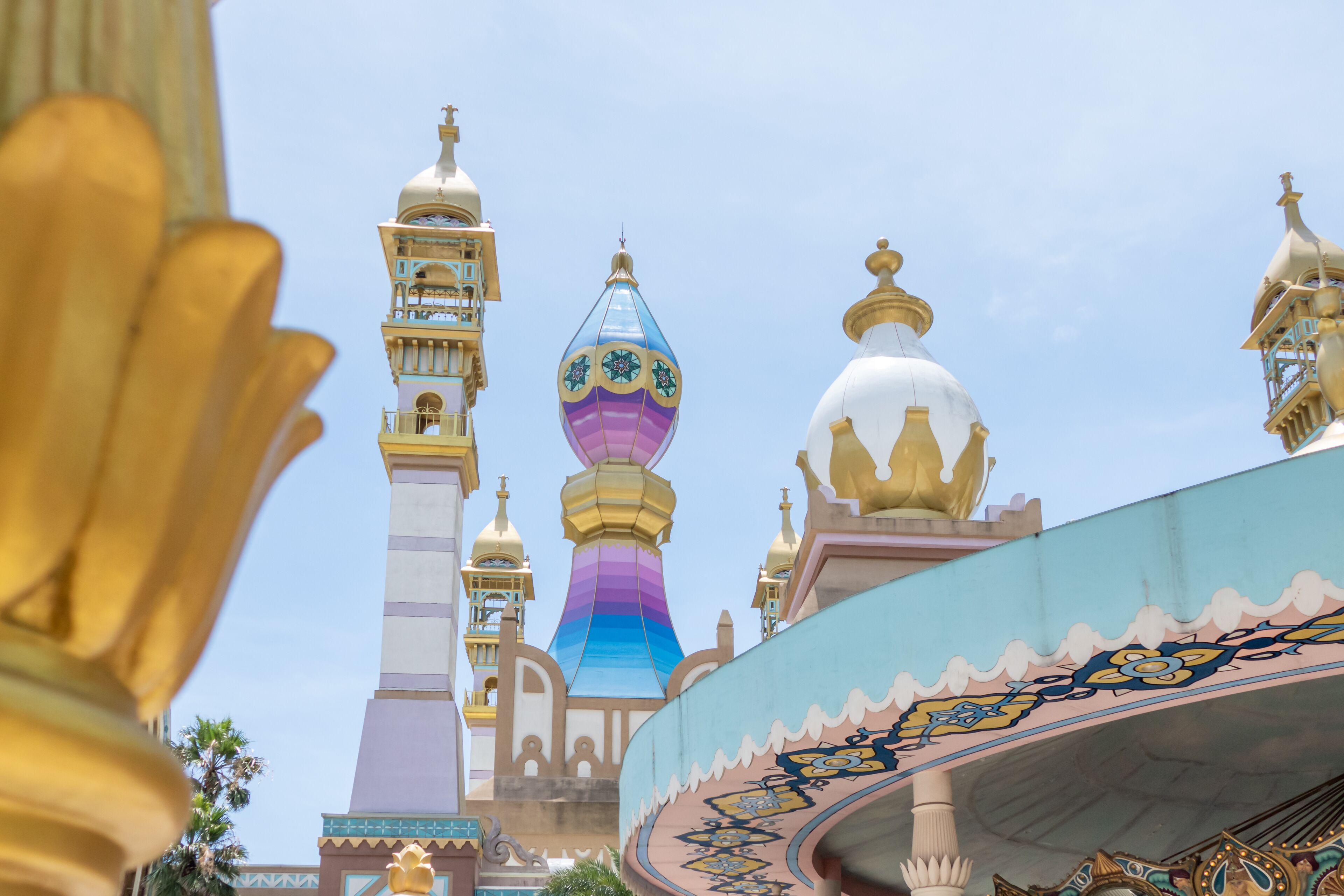 A colorful architectural structure with domes and towers.
