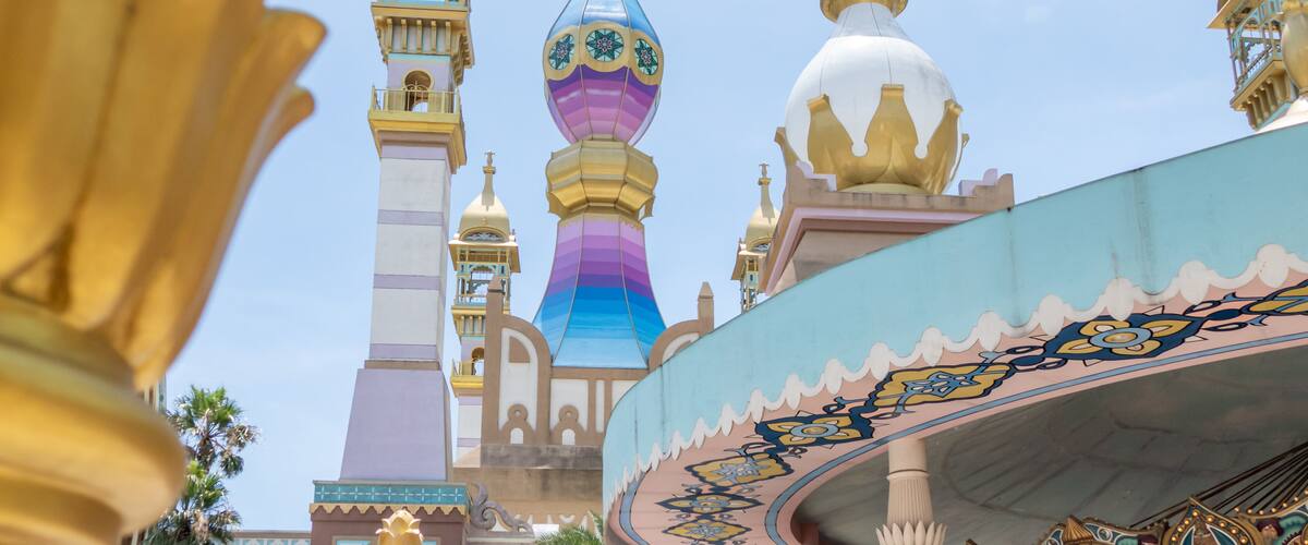 A colorful architectural structure with domes and towers.