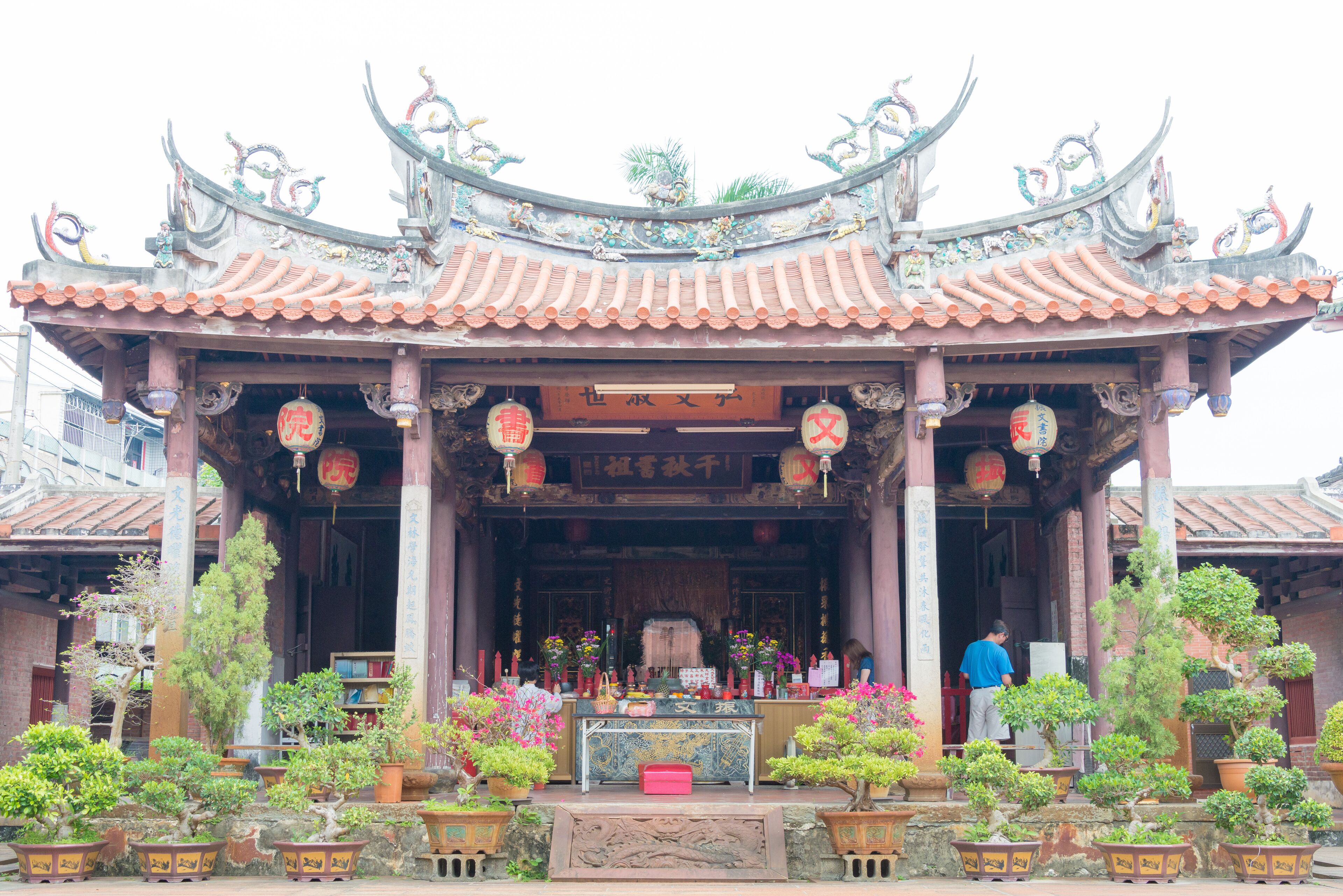 A traditional Chinese temple with ornate architecture, including curved roofs and intricate decorations.
