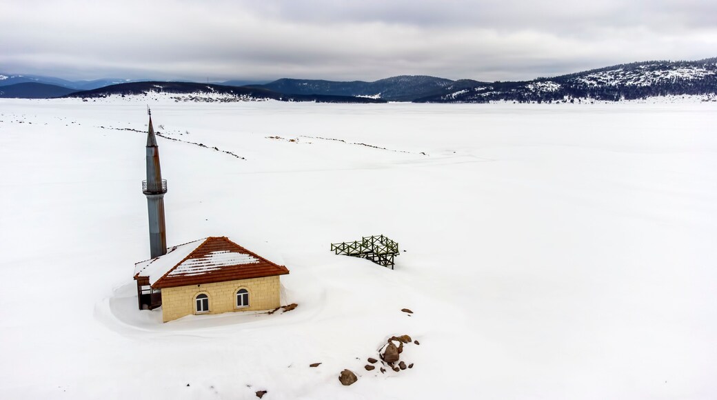 Aerial shot with drone, in winter snow landscape, Bolu - Seben - Turkey, Seben mosque view
