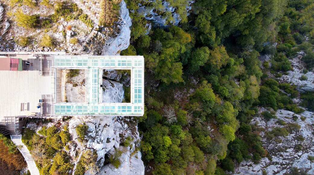 The scenic aerial view of Çatak Kanyonu, with people enjoying the autumn season on the glass sightseeing terrace at 450 m height, with an amazing panorama, Kastamonu, Turkey
