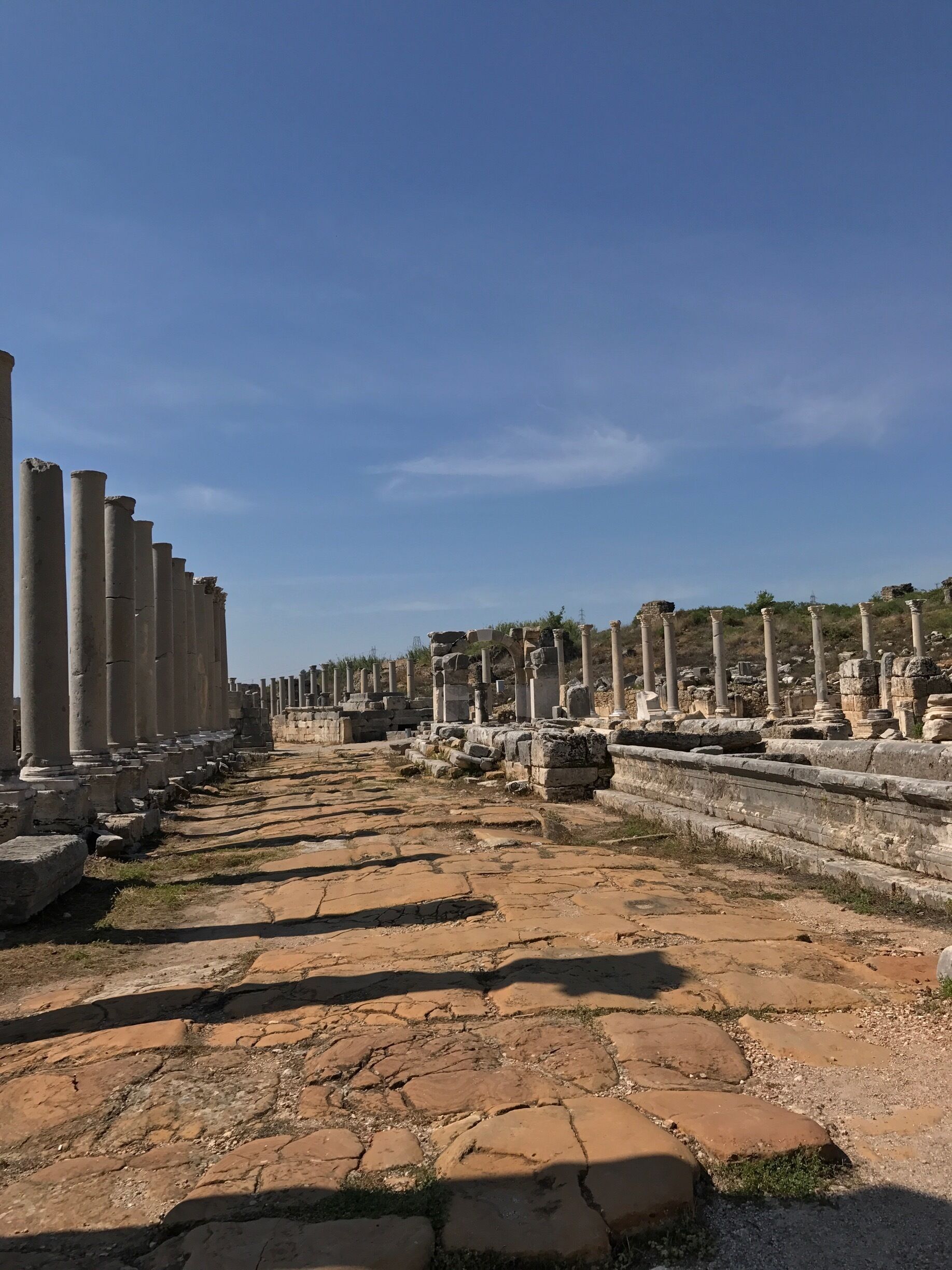 Looking down the Main Street in Perge. Ancient ruins in Antalya from around 1000BC  . It's a large site well preserved and makes for a fascinating walk around. Alexander the Great has walked down that street and the city is mentioned in the Bible. Well worth a visit if you are anywhere near.