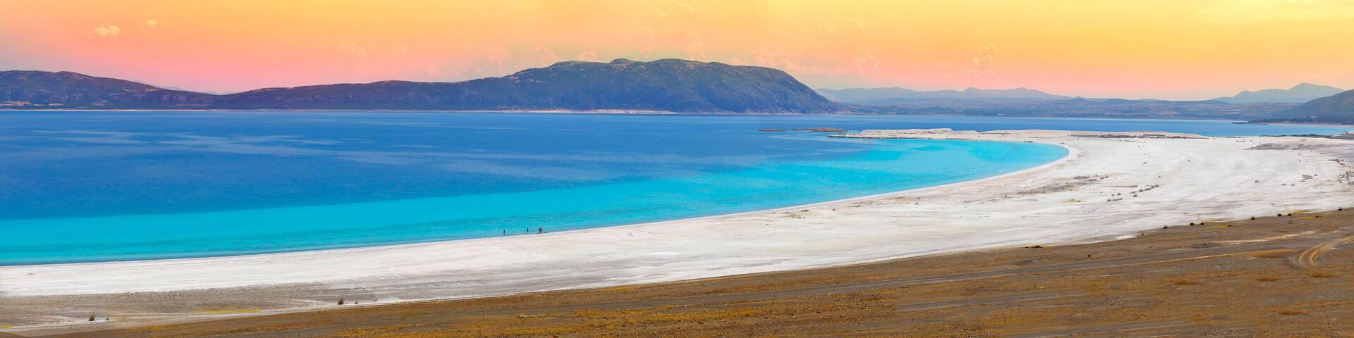 Salda Lake is a slightly salty karstic lake surrounded by forest-covered hills, rocky lands and small alluvial plains in the Yeşilova district of Burdur, 4 km away from the district center.