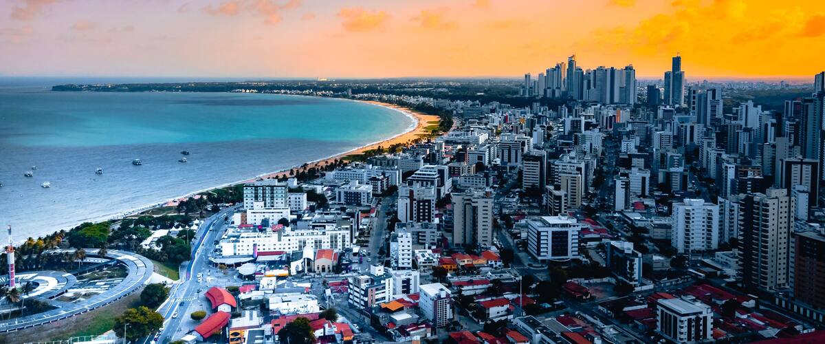 Cidade Litoral João Pessoa Paraíba Nordeste Brasil Praia Paisagem Tambau Hotel Arquitetura Mar Oceano Aéreo Por do Sol Drone Férias Turismo Turístico Verão Paradisíaco Cidade Urbano Azul Verde