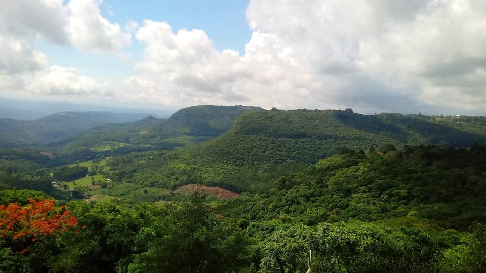 landscape with clouds: green mountains, blue sky, nature - gramado, rio grande do sul, brazil