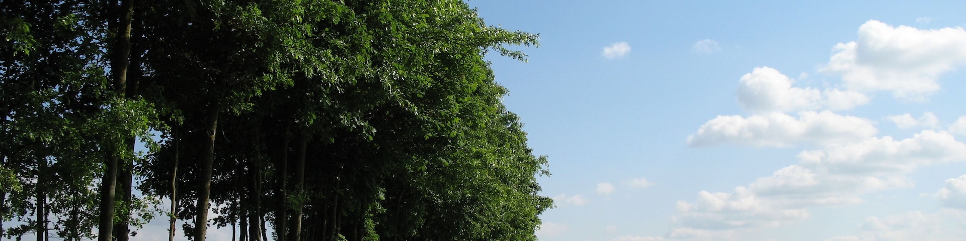 The countryside of the Ingooigem province of West Flanders, Belgium. On the right are the slopes of Tiegemberg Hill.