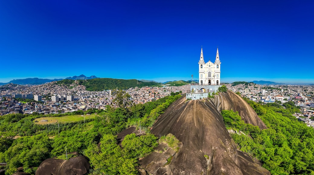 Panoramic Aerial View of Basilica Sanctuary of Our Lady of Penha Built on a Rock With Views of the Neighborhood Behind in Rio de Janeiro City