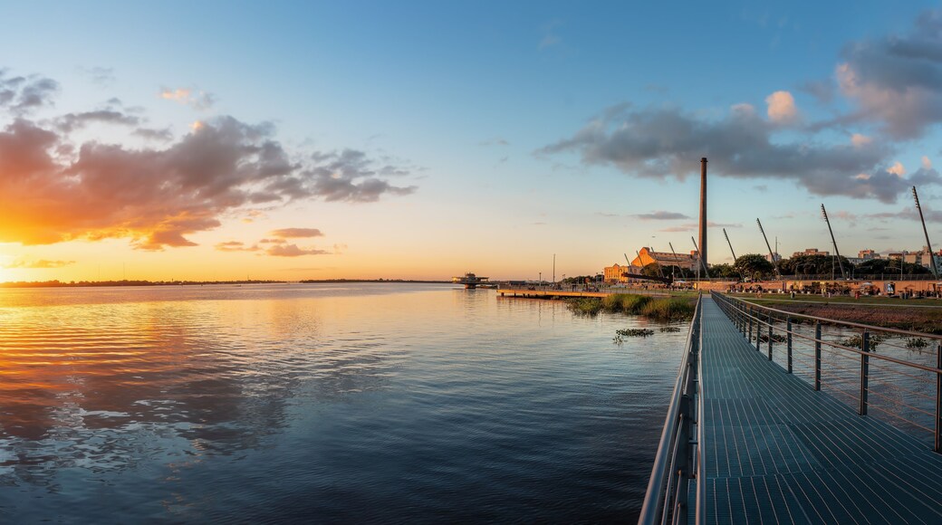 Panoramic view of Sunset at Guaiba River with Gasometro Power Plant (Usina do Gasometro) and Moacyr Scliar Park and - Revitalized Orla do Guaiba Waterfront - Porto Alegre, Rio Grande do Sul, Brazil