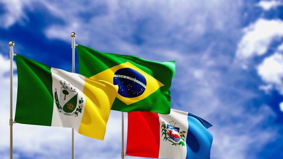 Official flags of the country Brazil, state of Alagoas and city of Arapiraca. Swaying in the wind under the blue sky. 3d rendering