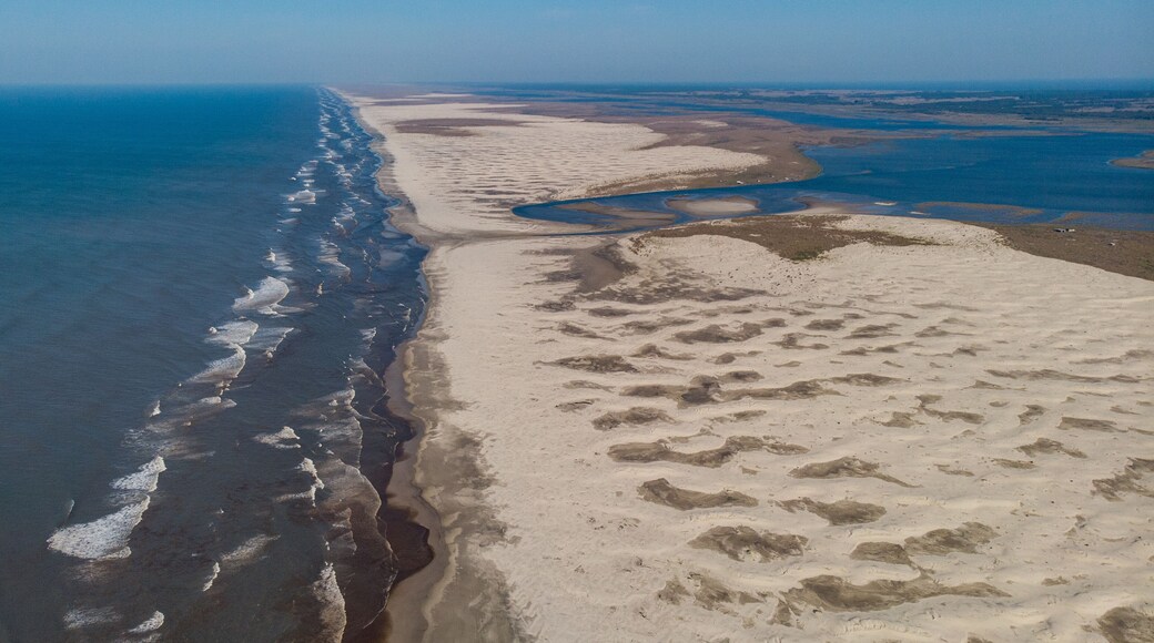 Aerial image of the dunes between Barra da Lagoa do Peixe, National Park, and the Atlantic Ocean at Praia de Tavares, Rio Grande do Sul, Brazil.