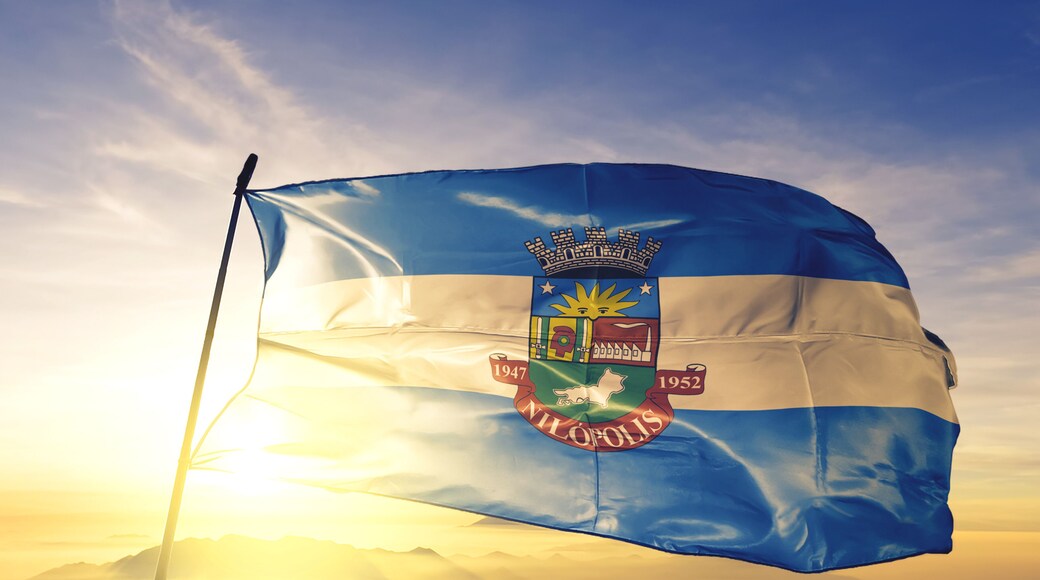 Nilopolis of Brazil flag waving on the top sunrise mist fog