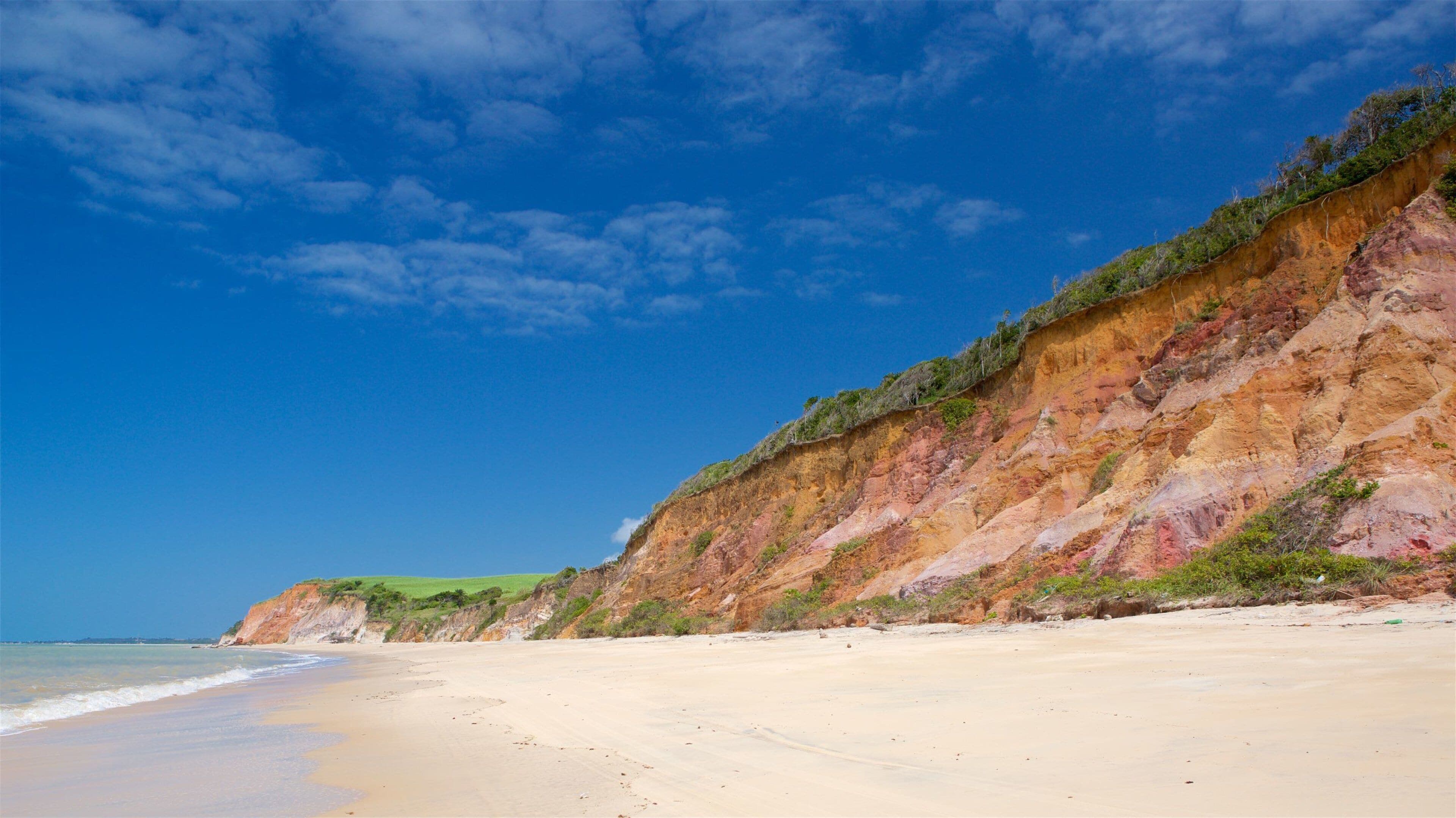 Barro Duro which includes general coastal views, a beach and rocky coastline