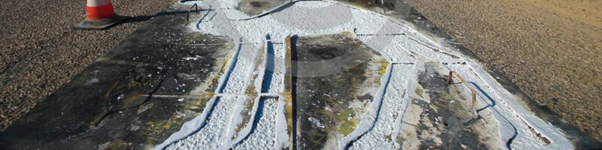 Camel crossing road sign in the middle of nowhere