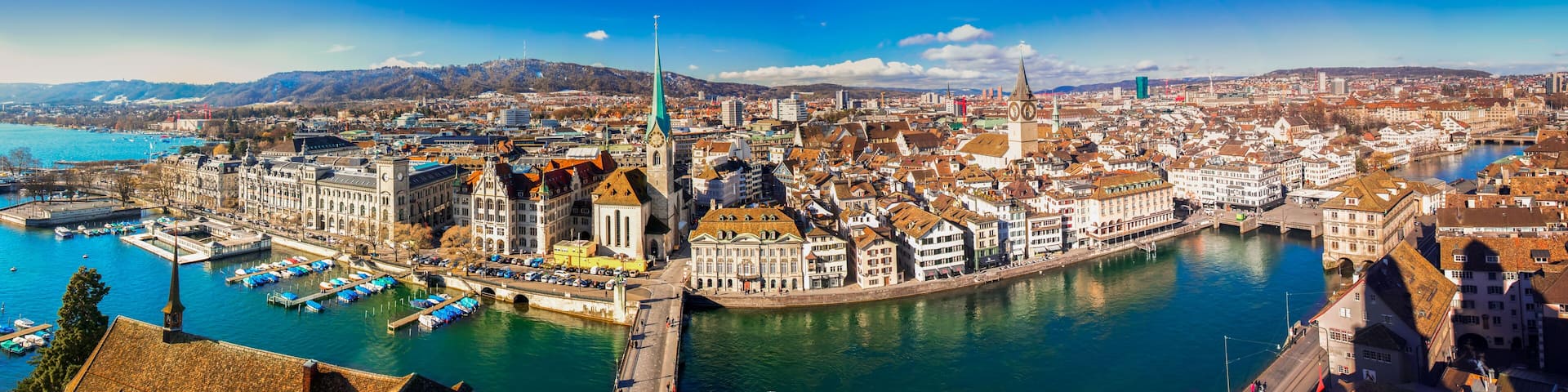 Historic Zürich city center with famous Grossmünster Church, Limmat river and Zürich lake. Zürich is the largest city in Switzerland