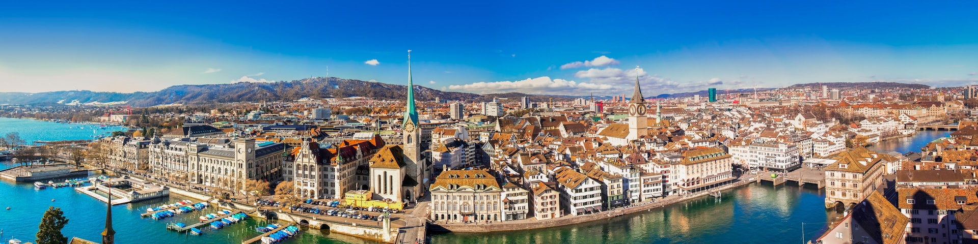 Historic Zürich city center with famous Grossmünster Church, Limmat river and Zürich lake. Zürich is the largest city in Switzerland
