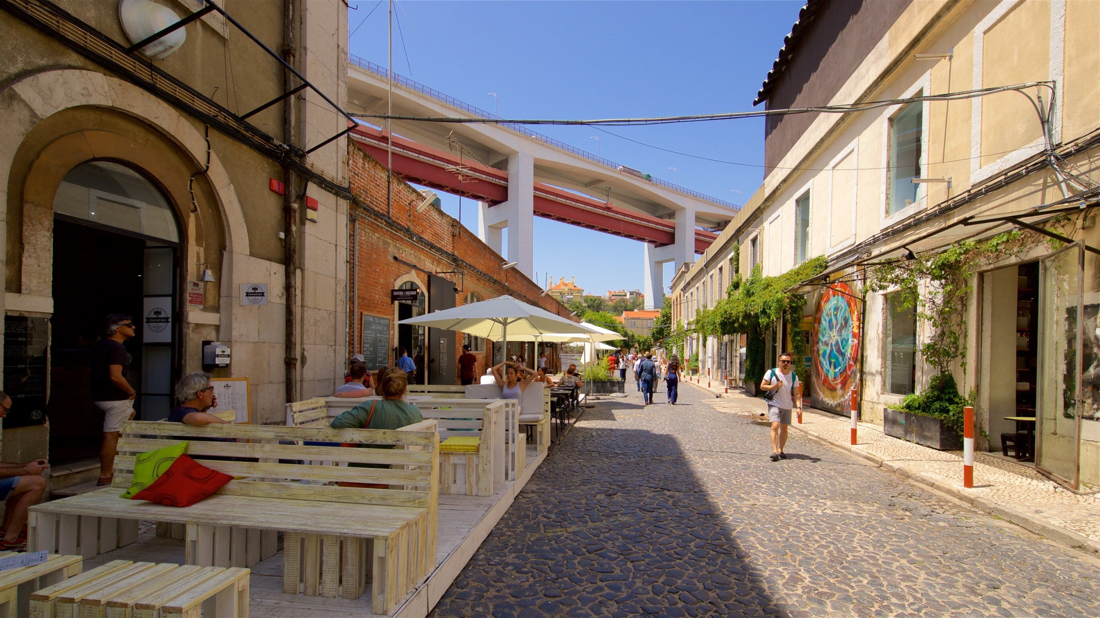 Lisbon District which includes street scenes as well as a small group of people